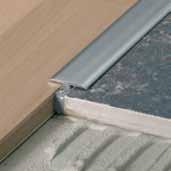 Transition and renovation profiles b 3,0 b 9,0 Brass & Aluminium Stainless steel Blanke T-Transition Profile The Blanke T-Transition Profile is designed to provide an attractive transition between