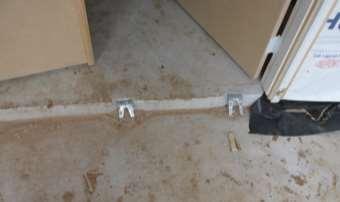 Mud sill anchors not in use (front entryway)