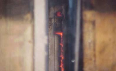 C9. Showing flames entering the cavity.