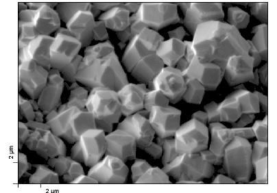 The SEM image shown in the figure 24(a) shows the as-deposited CZT film on CdS. The grain size was approximately 2 µm. The SEM image demonstrates loosely packed CZT grains.