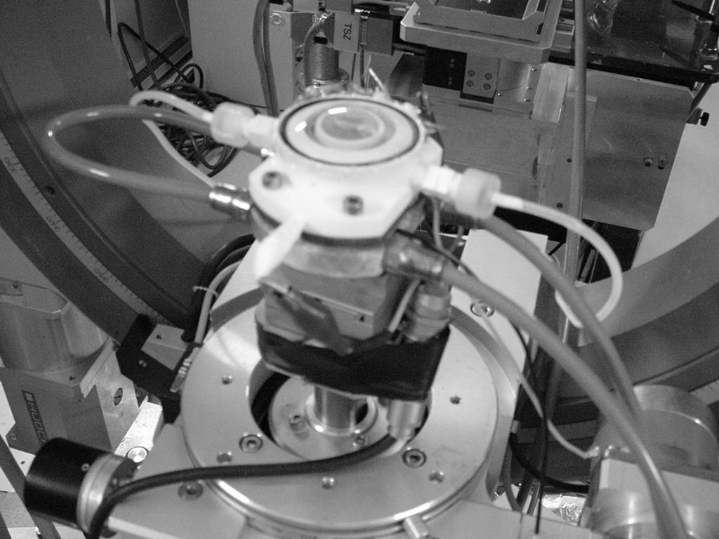 FIGURE 2 Peltier cooled electrochemical cell mounted onto the XMaS diffractometer Preliminary experiments using the cell have featured Au(hkl) single crystal electrodes, in particular, the lifting