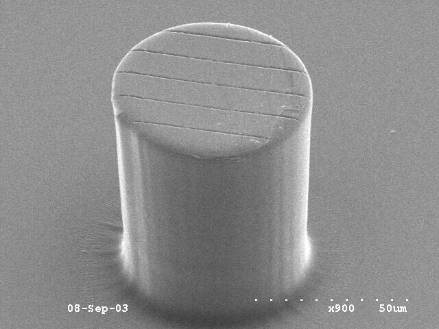 Figure 5.10 shows a polymer pillar with the imprinted diffractive grating feature on a photo-defined pillar structure.