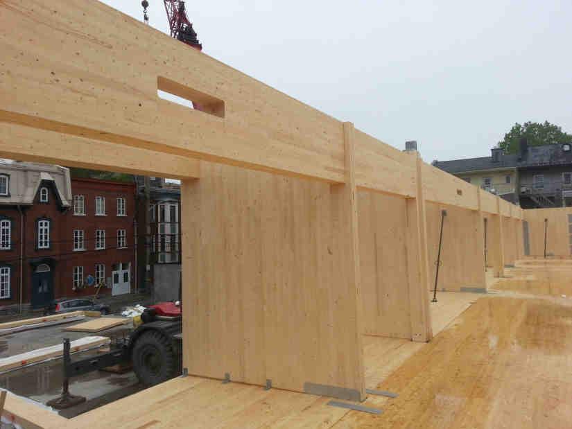 MATERIAL MIXING CLT AND GLULAM ALLOWS GREAT FLEXIBILITY: - ADAPTING TO AN ARCHITECTURE THAT WAS DESIGNED