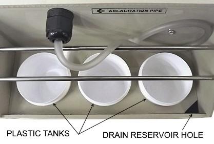 For this, move bottom or both metal rods to the left side of the unit and lift right tank up to fill the opened reservoir with the boiled water - please see picture below: PIC 2: INFO: This will