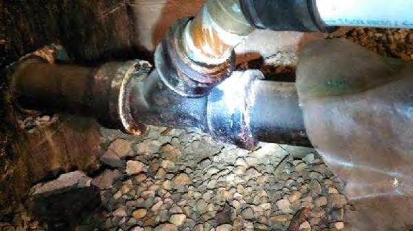 Acceptable Drain Pipes: drain lines are a mixture of copper PVC and cast iron There is evidence of a slow leak or weeping of water around the seal where the main toilet drains into the Main soil