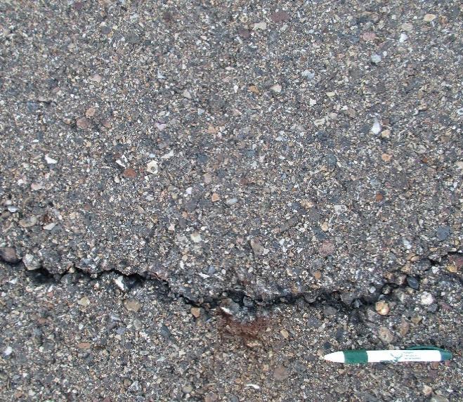 Longitudinal & Transverse Cracking (Non-Filled) Description: Asphalt pavement