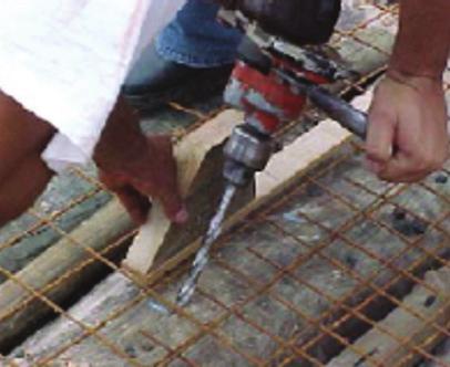 24 25 24 Preparation of the holes. Source: Pigozzo (2004) 25 Timber deck before concreting 26 Concreting of the timber deck.