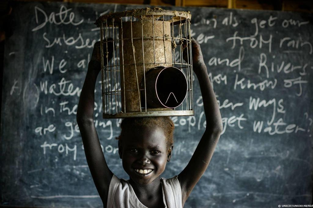 Nyaboth, a 6 year old South Sudan girl with her