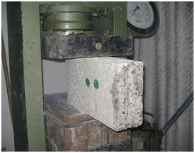Compression strength (Cs) was determined on the produced blocks at 28 days, using a compressive testing machine with a maximum capacity of 3000 kn.