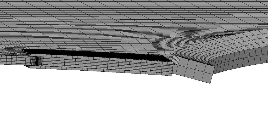 Figure 5.4: Bending of manhole with liner at the applied load of 50 MPa. Deformation scale factor = 100. 5.1.2 Loading and boundary conditions The deck is loaded with a uniform negative pressure.