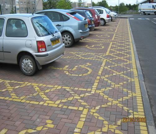 Worked Example 2 Calderglen High School Permeable paving at disabled parking spaces Detention basin with school to right and