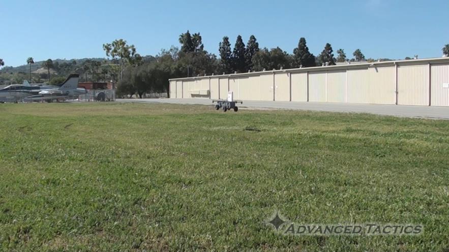 Figure 8: The AT Panther vehicle safely conducts test landings in an open clearing away from structures and people Figure 9: The AT Panther VTOL Air/Ground Robot shown during high speed fly by with