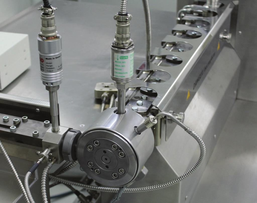 This formulation was manually mixed for three minutes in a PE- bag and dosed into the feed port of the extruder using a FlexWall gravimetric single screw solids feeder.