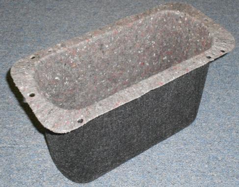 Janesville Acoustics designed a molded fiber liner that shields the metal storage bin from the engine, thus