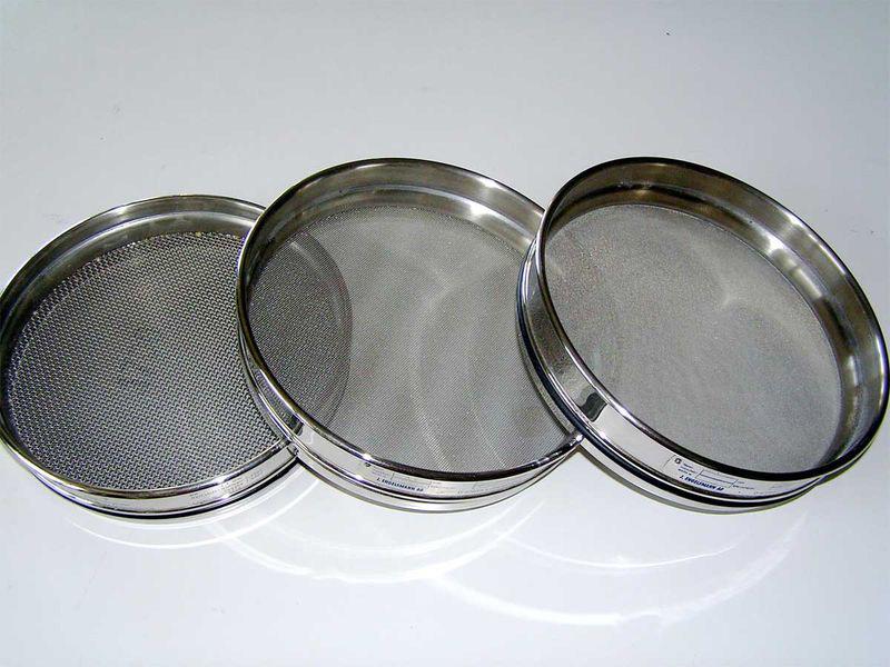 372 Analytical Chemistry 2.1 Figure 8.12 Three sieves with, from left to right, mesh sizes of 1700 µm, 500 µm, and 250 µm. Source: BMK (commons.wikimedia.com).