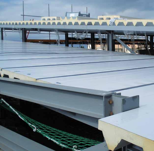 Product Data Application X-dek TM panels are insulated membrane covered roof panels suitable for flat roofs for all building applications except where there are low temperature