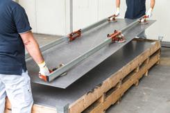 3. HANDLING LARGE FORMAT TILES AND CUTTING AND MAKING HOLES Current standards prescribe handling large format tiles with great care: at least two people are required and special tools