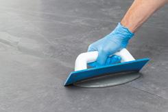 The grout lines may be filled with cementitious grout, such as Ultracolor Plus, or with epoxy grout, such as
