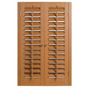 A firm that produces wood shutters and bookcases has received two