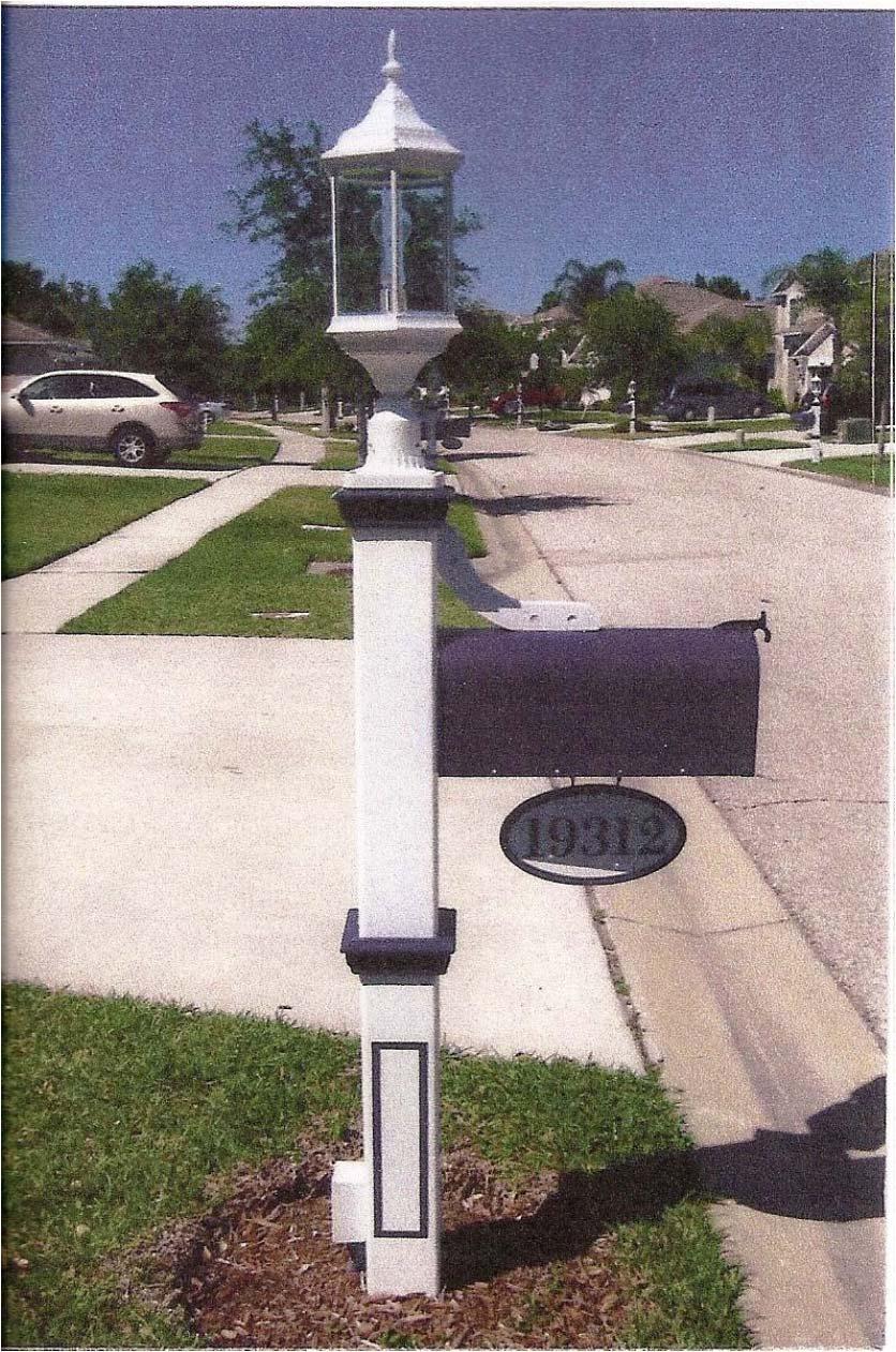 Appendix D MAILBOX SPECIFICATIONS AND DETAILS Mailbox and Lightpost Description: White 1-light 6-clear panel carriage style lantern on an outdoor post mounted from the bottom (lantern must be > 15 H)