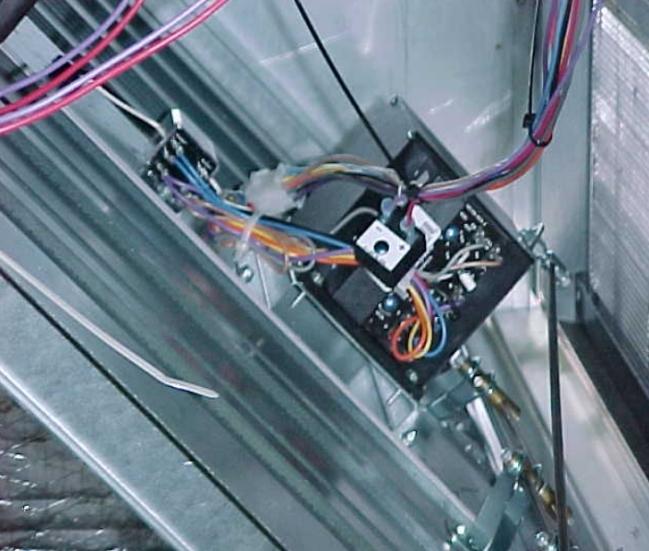 Then disconnect the (P-P1) jumper from the economizer control located on the actuator and connect the Q769C per wiring Diagram # 80CO201.