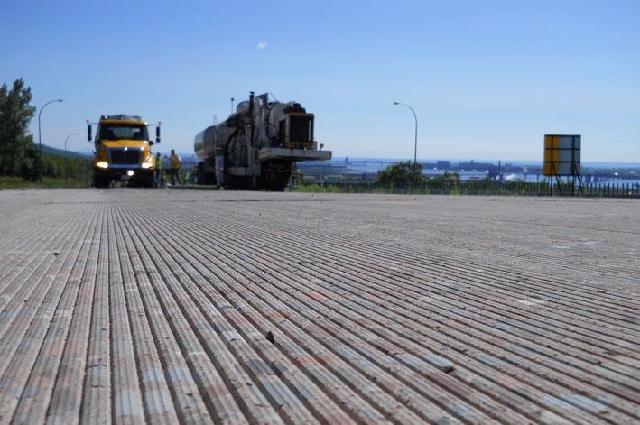 Figure 5-9: Next Generation Concrete Surface (NGCS) Grind and Groove (GnG) pavement. Implementation of quieter pavement measures will require night work with temporary lane closures. 5.3.