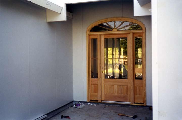 DAY 4: Wood finish entry door.