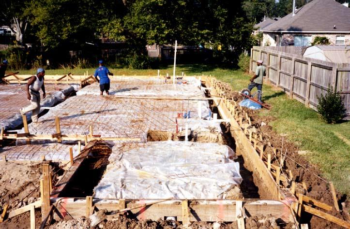 The building slab or foundation is prepared before the panels are delivered to the job site.