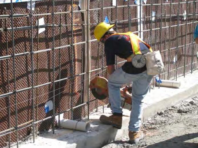Where specified, ensure cuts in horizontal rebar are in line with the crack inducer.