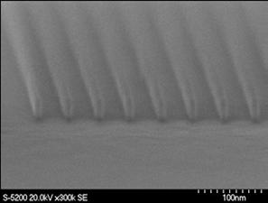 1 nm wide at a 100 nm pitch, exposed on a 55 nm thick resist using a dose of 25,000 μc/cm2 (6.