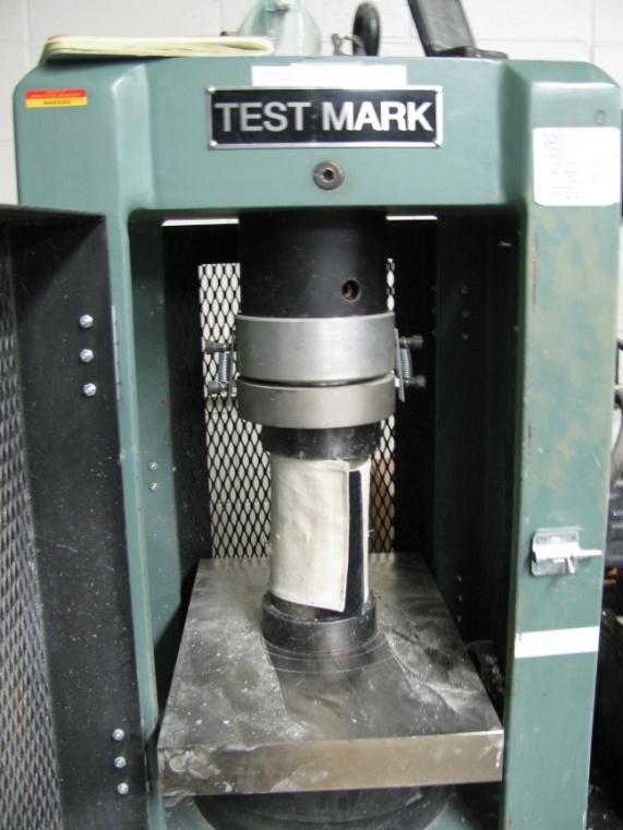 53 Strength Compressive strength tests were conducted on 2 specimens per mixture at 1, 3, and 28 days in accordance with ASTM C39 (Figure 23). Figure 23.