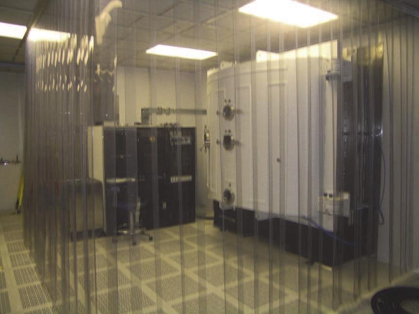 28 Lasers Applications in Science and Industry 4. Depositing high LIDT coatings at Sandia s large optics coating operation Coating large optics goes hand in hand with large vacuum coating chambers.