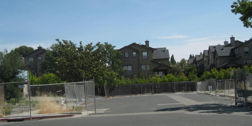 New Construction at VI Sites 17 The developer of townhouses along Mora Drive will complete the groundwater cleanup. The developer shall complete a Vapor Intrusion Investigation Work Plan.