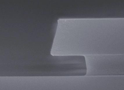 Dwell times are to be avoided; the liquid photoresist should not be left for more than 10 s on the standing wafer. The film thickness may be varied in a range between 1.6-4.0 µm.