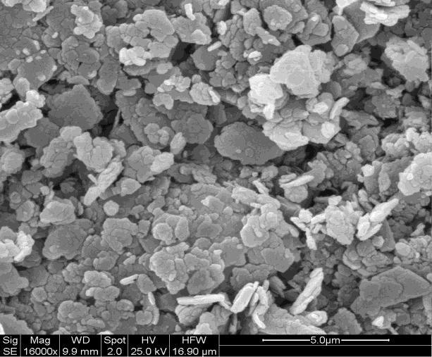 3%, 7 days) Fig. 9: SEM image of 5% lime treated kaolin clay (OMC=33.3%, 14 days) Fig. 10: SEM image of 5% lime treated kaolin clay (OMC=33.