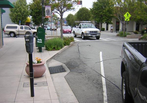 WHY USE GREEN STREETS AND GREEN PARKING LOTS?