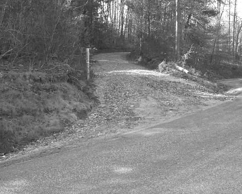 This entrance onto a public roadway from a forest road is well stabilized.