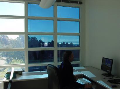 FIGURE 2: The same installation, with a different set of panes in the tinted state. Note the reduction of glare, preservation of view, and daylighting flexibility from zone control.