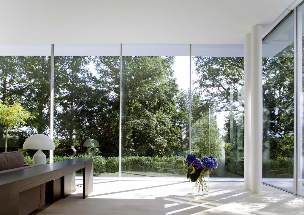 The frameless sliding and fixed window system KELLER minimal windows captivates by slim profile geometry and flush-fitted floors, ceiling and walls installation.
