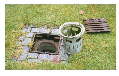 The system is usually equipped with overflow holes to prevent backwater conditions during heavy runoff producing events. Figure 15