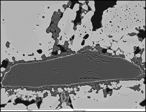 AlPO 4 (6-8 mm below Fig. 13 SEM micrograph of NETL developed phosphate containing Cr 2 O 3 refractory after expose to slag in a field trial 6.