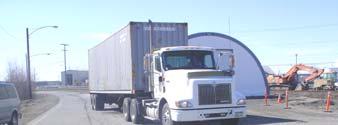 Trucks also deliver containers to freight consolidators and warehouses 12 in Anchorage who further break down the cargo for smaller deliveries.