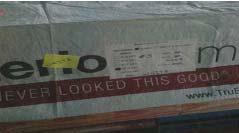 The covering contains labels showing date of manufacture and siding widths. Care shall be taken to keep the siding covered until installed.