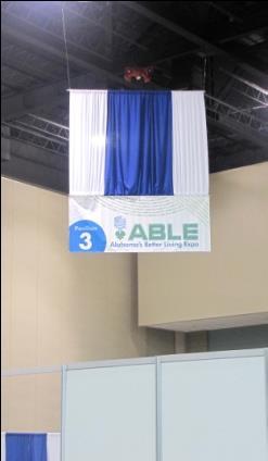 CUSTOM HANGING SIGN RENTAL TWO- SIDED (4FT TALL BY 8FT WIDE) FOAM CORE SIGN with 8ft DRAPERY: $595 (Price includes two-sided sign, rental of all