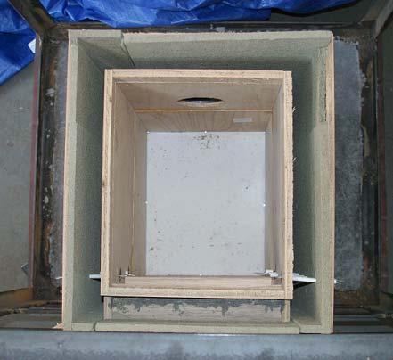 Figure 5.6 Furnace Molds- Top View with Insulation Blocks Inside The refractory was mixed with water in a commercial mixer and the walls were cast in a sequence starting with the furnace base.