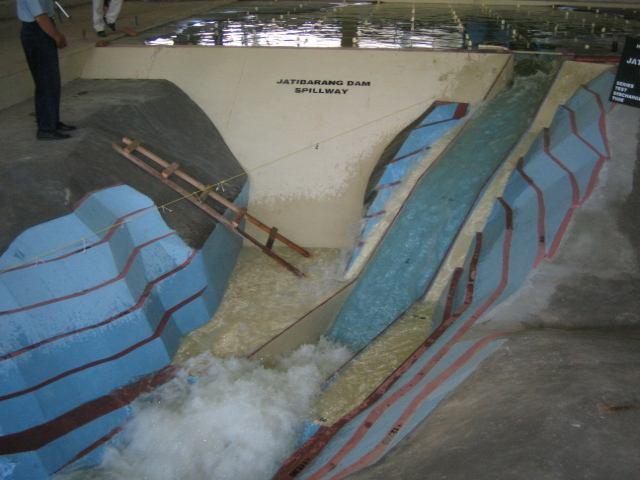 3. Research Methodology A hydraulic test has been hung out to find the better position for the spillway.