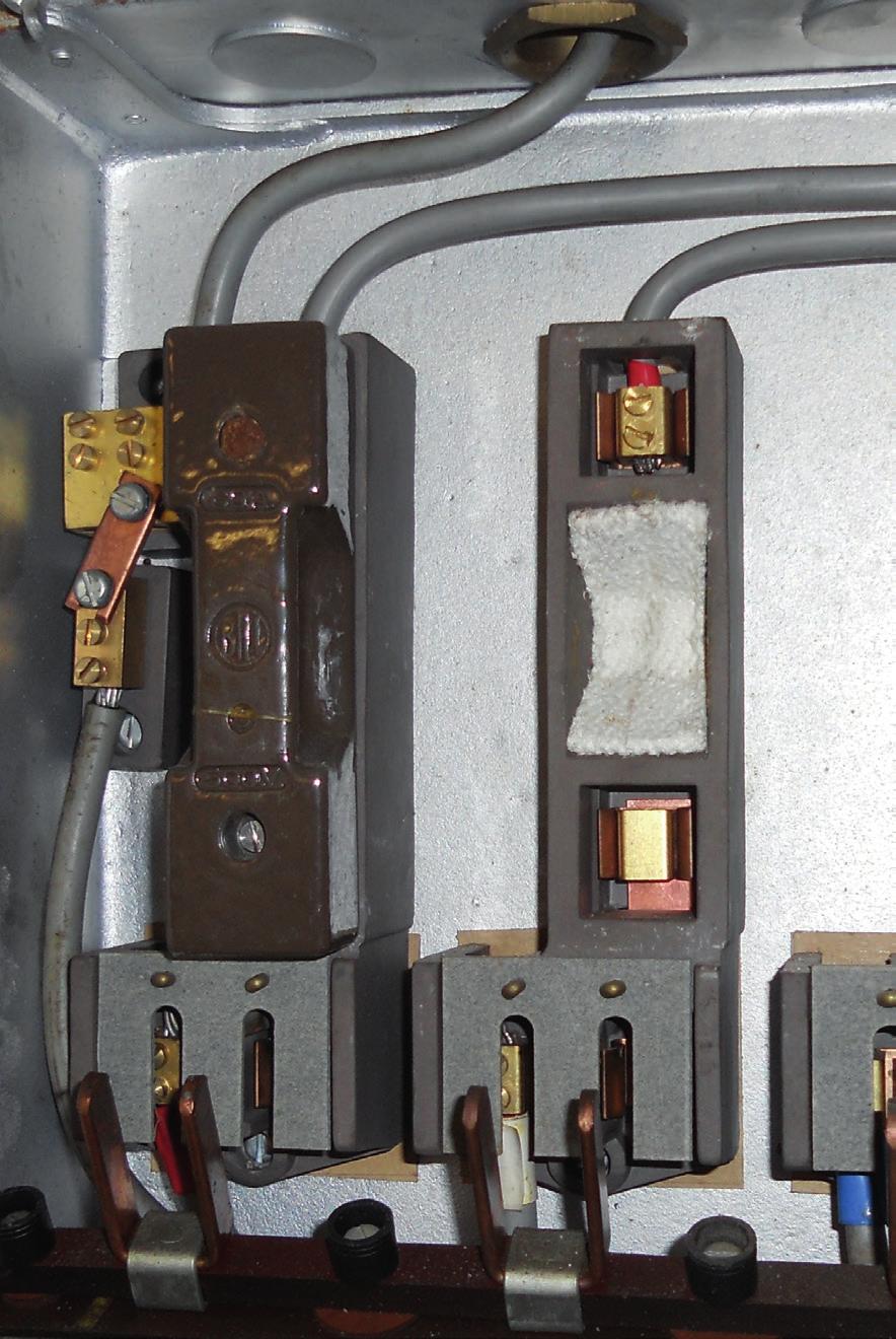 AIB back board Asbestos flash guard GAS/ELECTRIC METER AND FUSE BOX Often found in halls and under stairs In old style fuse boxes each fuse wire may have an individual