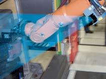 with the LMS500 laser scanner on the robot and the robot cell - facilitates loading processes and
