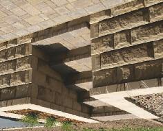 Allan Block Capstones, pavers, poured concrete, crushed rock, mulches and flagstone are good stair tread examples.