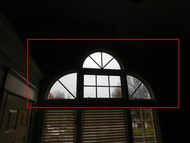 6.6 (2) The upper windows (semi-circles) have moisture in between the glass panes from a failed